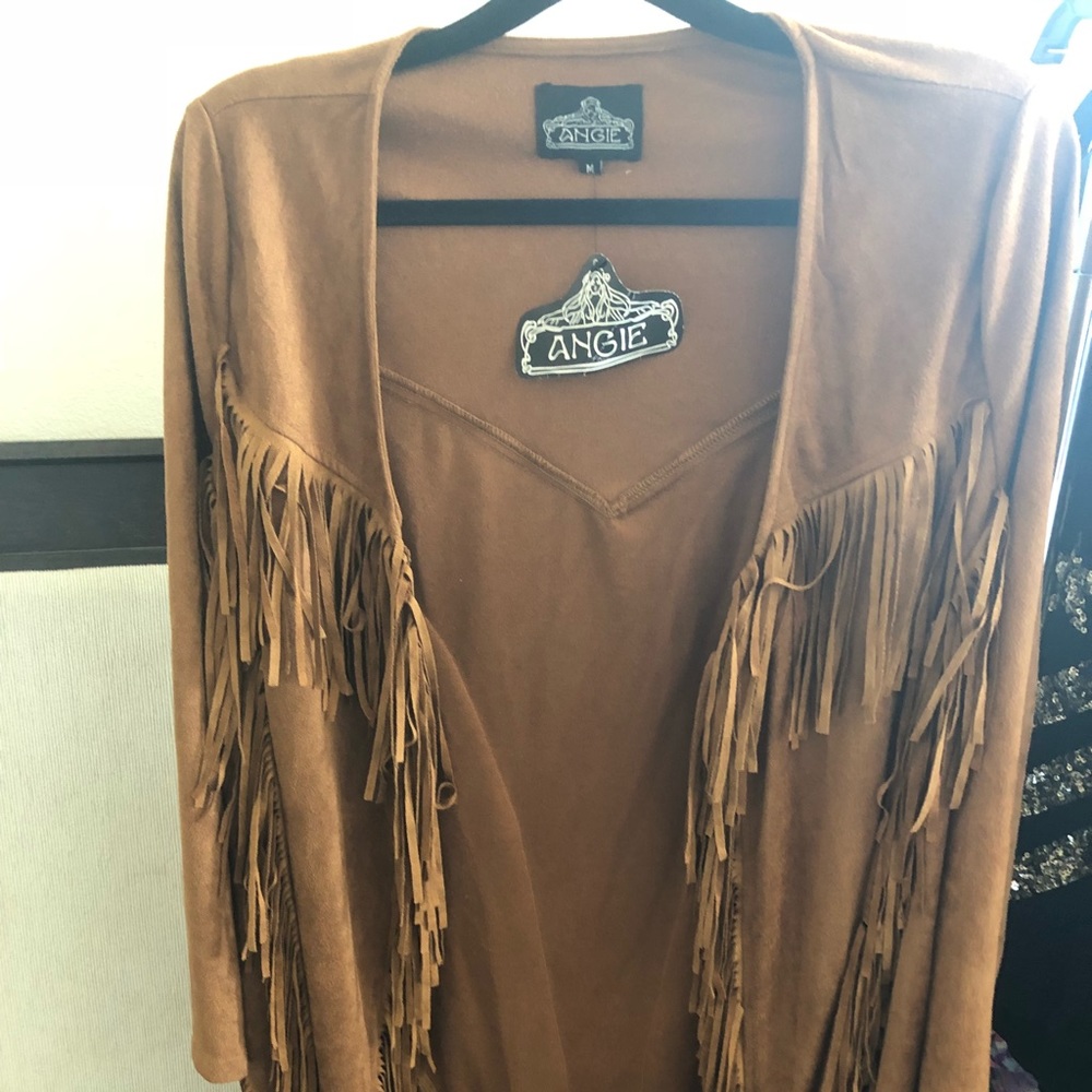 Tan fringe jacket Coachella stagecoach